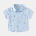 Camicia bambino a maniche corte con stampa astronauta celeste e bottoni bianchi - 90cm / Celeste