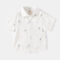 Camicia per bambini a maniche corte in cotone bianco con stampe di astronauti e pianeti - 90cm / Bianco