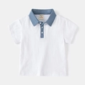Classic kids white polo shirt with blue collar and soft cotton fabric texture - 90cm / White