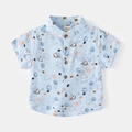 Camicia da bambino azzurra a maniche corte con stampa di elefanti e bottoni - Blu / 90cm