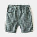 Detail of boys plaid cotton shorts featuring elastic waistband and side stripe accents - 90cm / Green Plaid