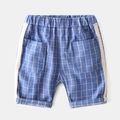 Detail of light blue checkered kids shorts with side stripes and double square pockets - 90cm / Lake Blue Plaid
