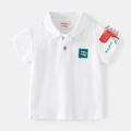 Witte katoenen poloshirt voor jongens met cartoon dinosaurus op de mouw en stoere ROAR-patch - 90cm / Wit