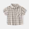 Camicia a quadri da bambino in cotone con tasca e bottoni nei colori marrone e grigio scuro - 90cm / Quadri Marrone Bianco