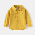 Front view of ginger yellow cotton shirt for kids with long sleeves and dual chest pockets - 90cm / Yellow