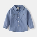 Detailed close-up of blue cotton kids long sleeve shirt with double chest pockets - 90cm / Blue