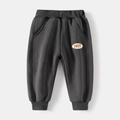 Pantaloni sportivi grigio scuro per bambini con ricamo 1977 e vita a costine - 100cm / grigio scuro