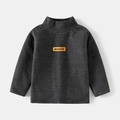 Detail view of children stripe long sleeve shirt with orange label and turtle neck - 90cm / Black Stripe