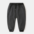 Kids black and white striped joggers with elastic waist and cute smiley face print - Black Thin Striped