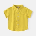 Kids bright yellow short sleeve cotton shirt with V-neck and white buttons detail - 90cm / Yellow