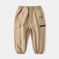 Detailed view of kids cargo joggers with elastic waist and small elephant embroidery - Khaki / 90cm