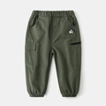 Detail of army green cargo pants featuring elastic waist and embroidered elephant pattern - Army Green / 90cm