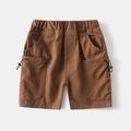 Boys brown cargo shorts with elastic waist and utility pockets for summer casual wear - Caramel color / 90cm