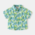 Detail of boys short sleeve shirt with abstract geometric patterns and chest pocket - 90cm / Bright Green