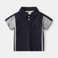 Jungen Polo-Shirt in Dunkelblau mit grauen Kontrasten und klassischer Brusttasche - 90cm / Marineblau