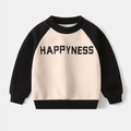 Detail of kids raglan sweatshirt featuring HappyNess lettering and ribbed cuffs - Apricot / 90cm