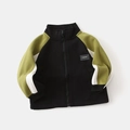 Detail van de zwarte FASHION-patch op een gevoerd winterjack voor jongens - 90cm / Zwart en Groen