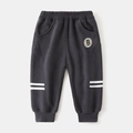 Detailed view of kids dark grey corduroy pants with elastic waist and B embroidery patch - 100cm / Dark Gray