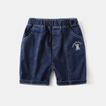 Detailed close-up of boys' denim shorts featuring elastic waist and TREND WAPYPY embroidery - 90cm / Denim Dark Blue