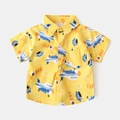 Detalle de camisa de algodón amarilla con estampados de aviones y bolsillo en el pecho - 90cm / Amarillo Avión