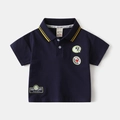 Detail of navy cotton polo shirt with yellow stripes on collar and cartoon embroidery - 90cm / Navy Blue