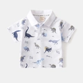 Dettaglio del colletto della polo in cotone bianco con stampe di dinosauri colorati - Bianco Stampa Dinosauri / 90cm