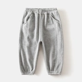 Close-up of boys thick fleece sports pants with elastic waist and GOODTHING print - 90cm / Light Gray