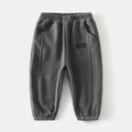 Detail view of boys thick fleece sport pants featuring elastic waistband and GOODTHING embroidery - 90cm / Dark Gray