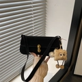 Black suede underarm baguette bag with golden buckle and cute plush monster charm - With Pendant / Black