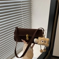 Dark brown suede shoulder bag with gold twist lock and cute star charm accessory - With Pendant / Brown