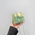 Mini sac bandoulière vert clair avec texture litchi, nœud et poignée perle - Vert