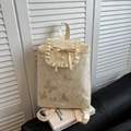 Chic cream bow backpack with butterfly texture and ruffle trim for school and daily use - Beige