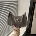 Grey leopard print hobo bag with a silver metal butterfly bow and a matte texture - Gray