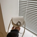 Mini beige crossbody bag with litchi texture and heart-shaped metal lock detail - White