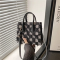 Mini checkered denim crossbody bag with frayed edges and black leather handles - Black