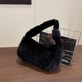 Minimalist black faux fur shoulder bag with soft plush texture and wide strap - Black