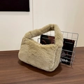 Chic light brown plush underarm bag with soft long faux fur and gold zipper detail - Khaki