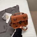Chic brown retro crossbody bag with metal lock and top handle in minimalist style - Brown