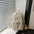 Minimalist beige nylon backpack with multi-pocket design and adjustable straps for women - White