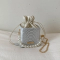 Fashionable snake print bucket bag with pearl handle and golden chain in cream white - White