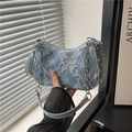 Light blue denim crescent shoulder bag with white star patterns and fringe detail - Blue Pentagram