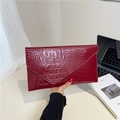 Red crocodile pattern envelope clutch bag in glossy finish with stylish rectangle shape - Red