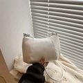 Elegant white faux leather half-moon shoulder bag with vertical stitching and silver hardware - White