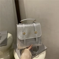 Chic silver snake embossed mini backpack with gold studs and top handle strap - Silver