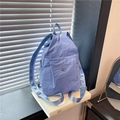 Versatile light blue nylon backpack with metallic M logo and stylish textured finish - Blue