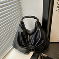 Borsa hobo nera stile casual con dettaglio maxi fiocco e finitura in ecopelle - Nero