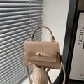 Schicke khakifarbene Leder-Umhängetasche mit goldenem Drehverschluss und Handgriff - Khaki