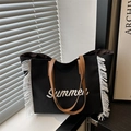 Black canvas tote bag with white Summer embroidery, side fringes and brown handles - Black