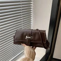 Dark brown matte leather shoulder bag with silver metal clasp and knotted strap detail - Brown