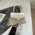 Elegant white quilted crossbody bag with crocodile texture detail and gold metal buckle - White
